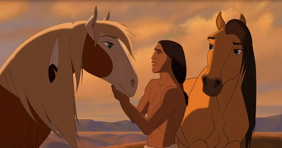 Pocahontas stands between two horses, gently touching one, with a warm sunset backdrop.