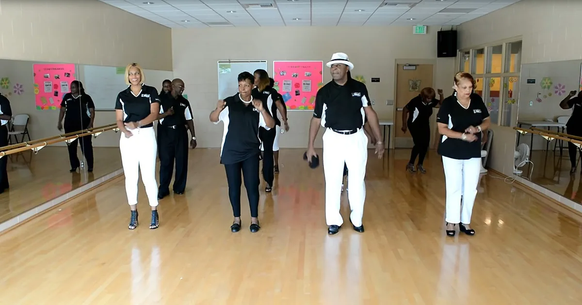 Line Dancers Glide Across the Floor With Smoothest Performance
