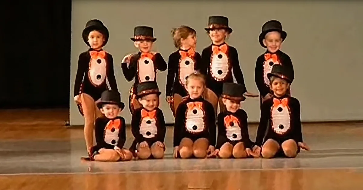 Tiny Dancers Waddle on Stage for Adorable Penguin Performance