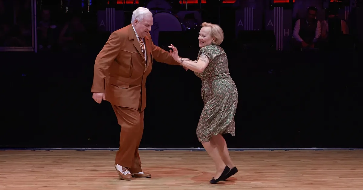 Elderly Dancing Couple Lights up Dance Floor