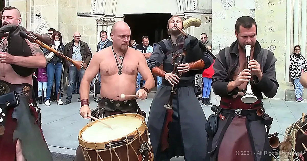 Traditional Celtic Rock Group Plays Stirring Song for Cheering Crowd