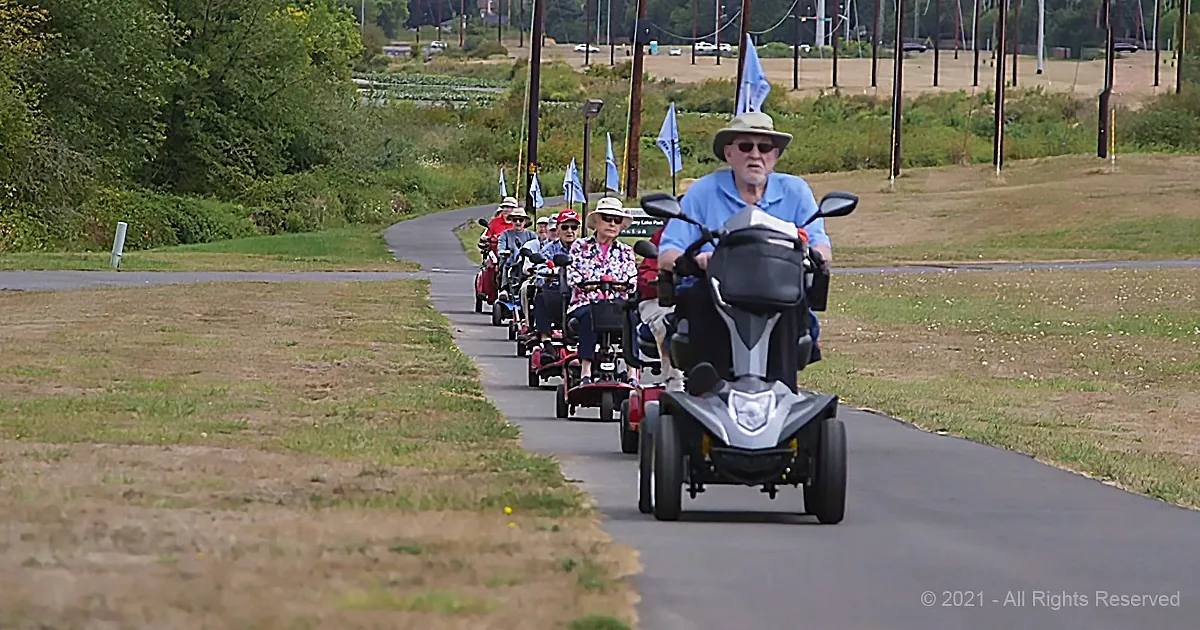 Decorated 97-Year-Old WWII Pilot Leads the Way of an All Senior Scooter Club