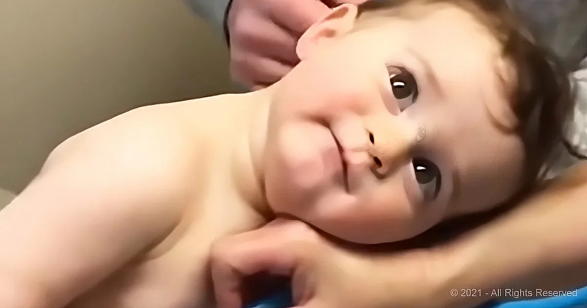 Adorable Toddler Finds Comfort in the Hand of a Nurse