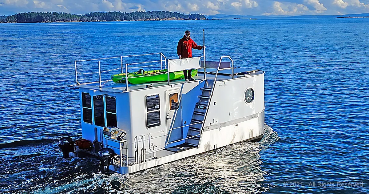 See Inside This Tiny House Boat With an Epic Rooftop Deck