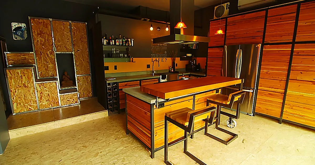 A modern kitchen with wooden accents, a central island, and a wine rack.