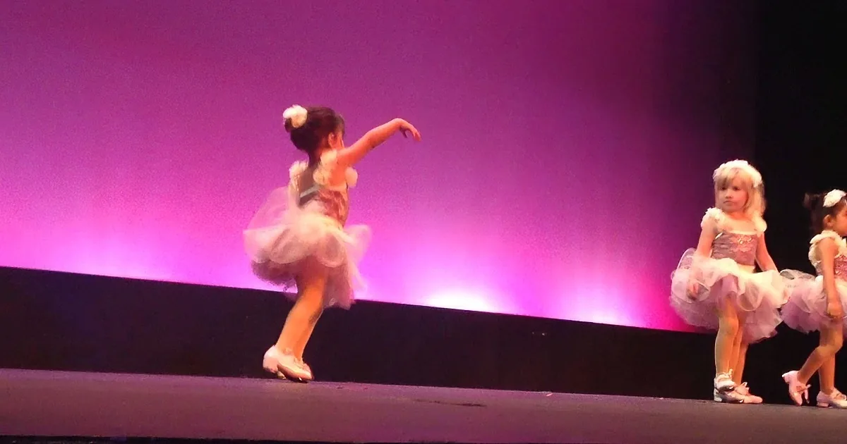 Girl's Dance Recital Takes an Adorable Turn When She Spots Her Family