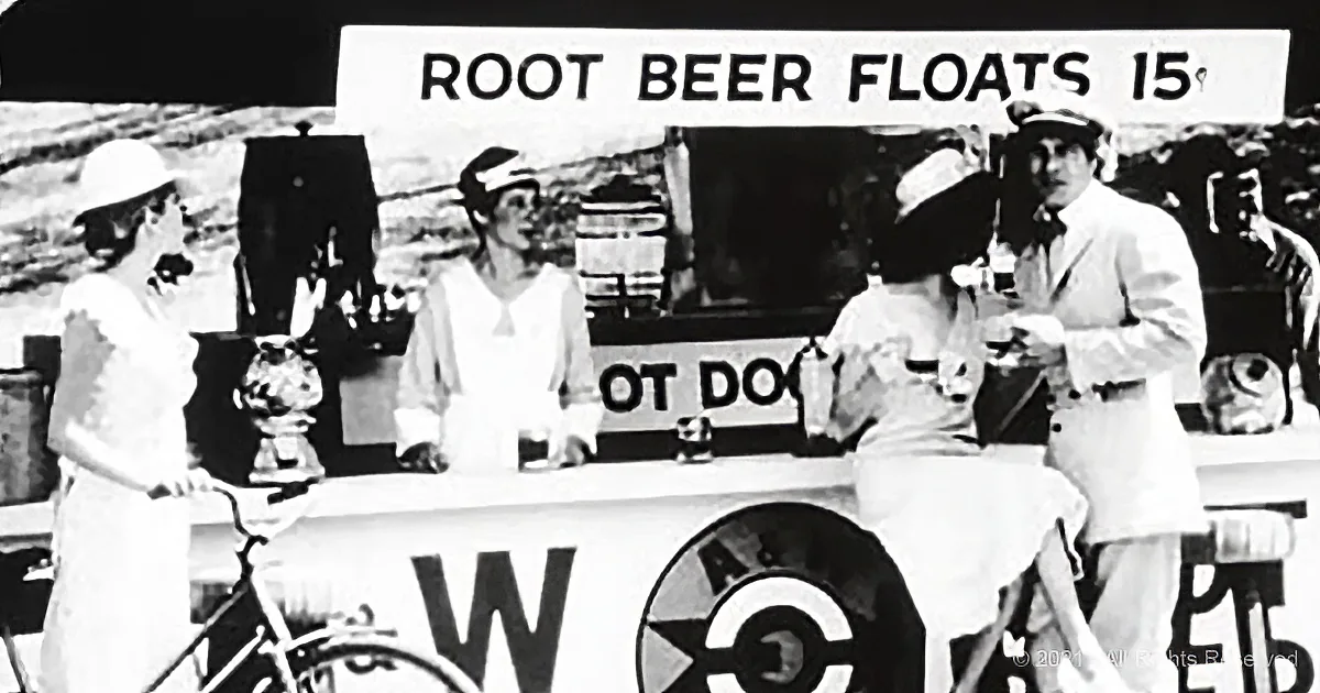 A vintage scene with people at a root beer float stand, sign reads "ROOT BEER FLOATS 15¢".