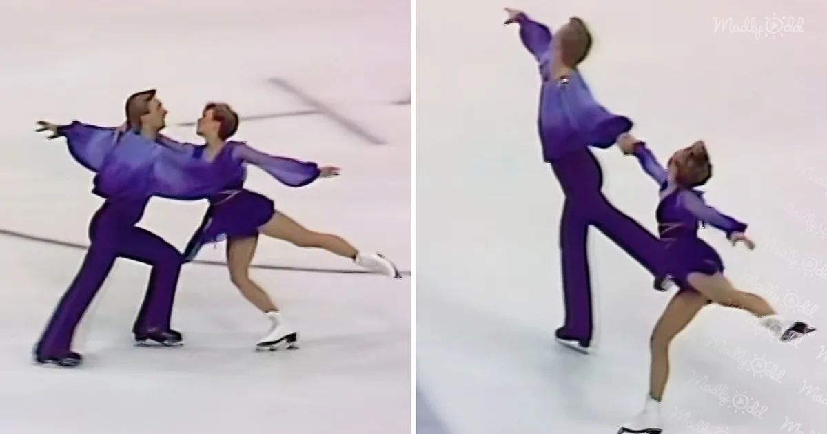 A figure skating couple in purple costumes performs synchronized moves on ice.