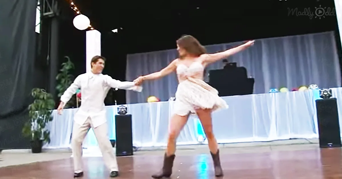 Bride & Groom change attire and put on hilarious ‘Footloose’ routine