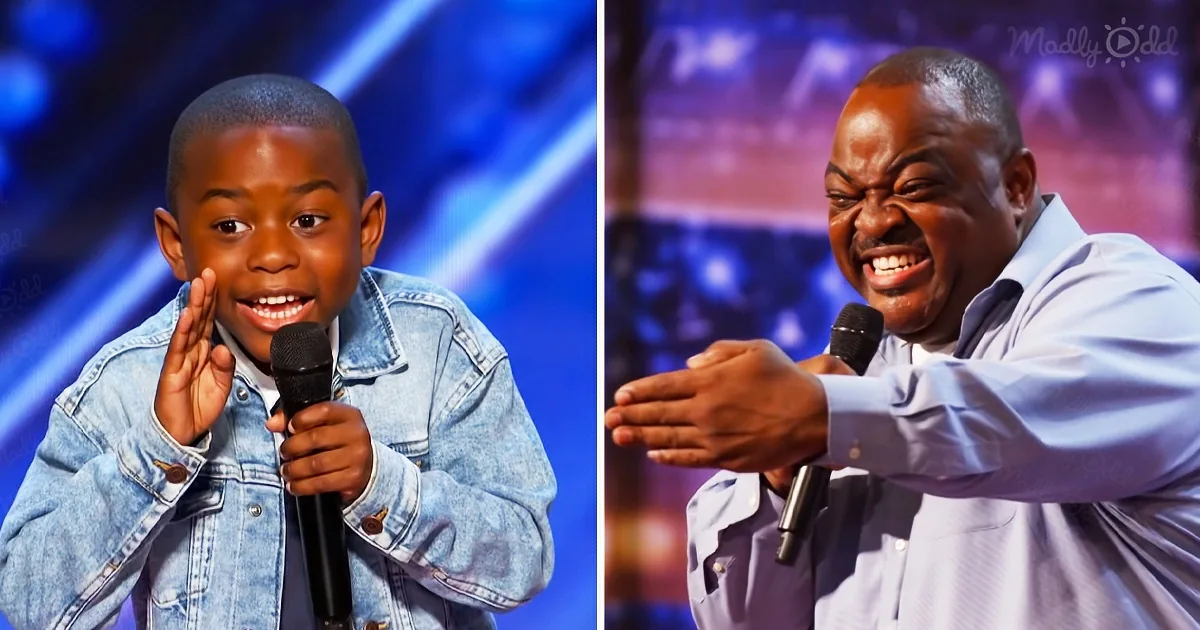 A young boy in a denim jacket holds a microphone, smiling, while a man in a light blue shirt claps and laughs...