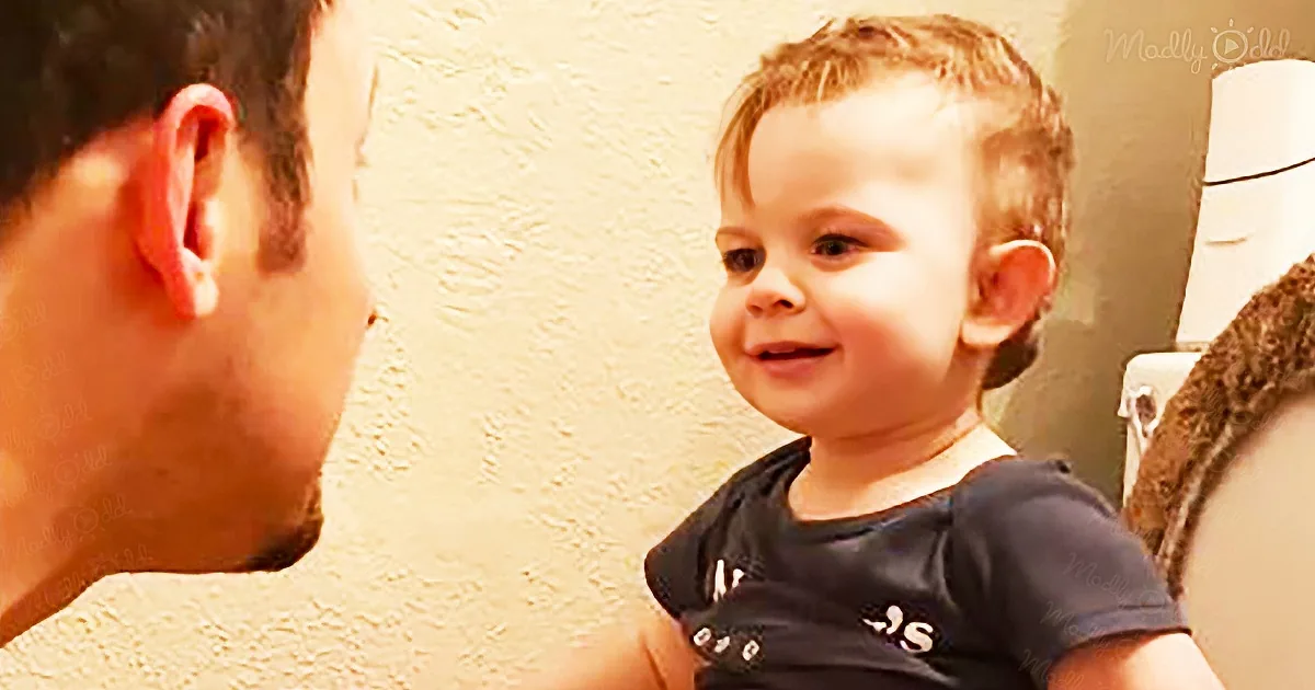 Young boy cracks up his dad while being potty trained