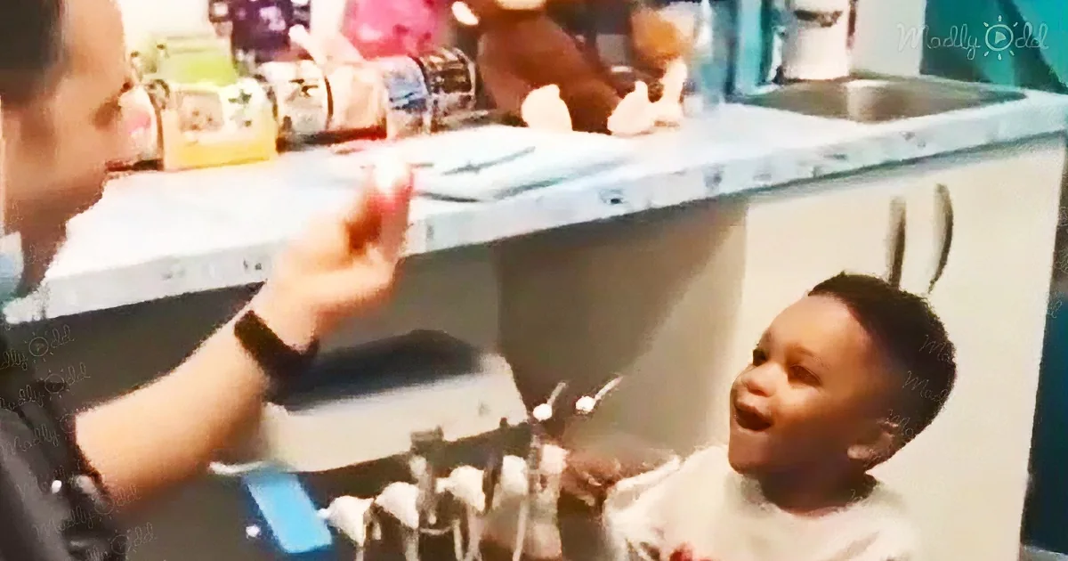 Young boy can’t help but smile at the magic trick