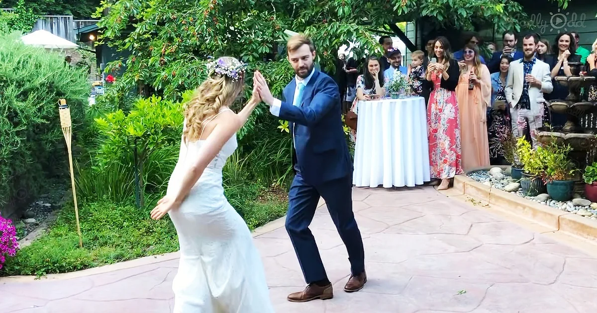 Wedding guests laugh as newlyweds bust out their funny dance moves