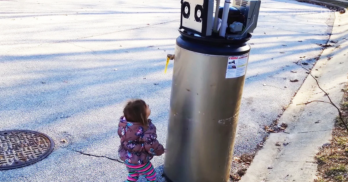 little girl meets her new robot friend