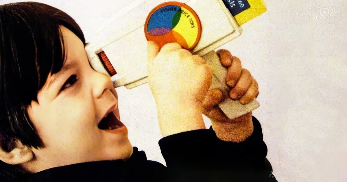 Kid with Fisher-Price’s Movie Viewer
