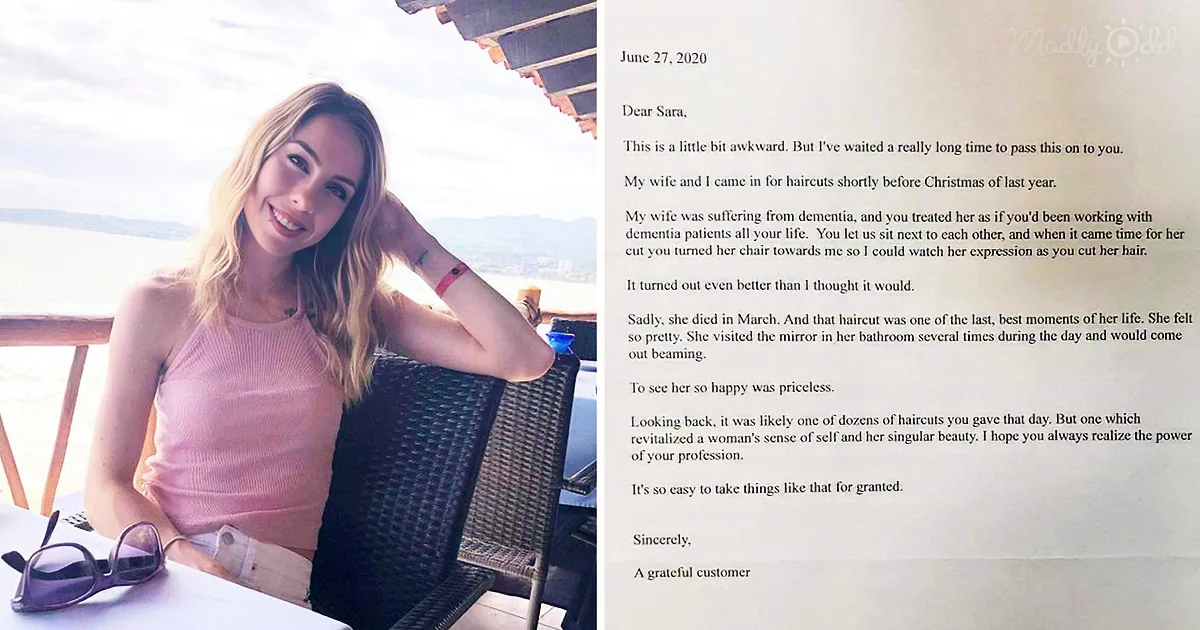 A woman smiles at a table, wearing a pink top, with a heartfelt letter beside her detailing a touching haircut experience.