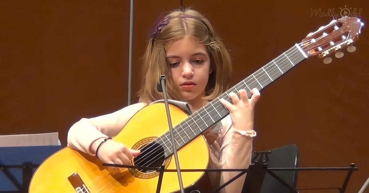7-year-old playing guitar