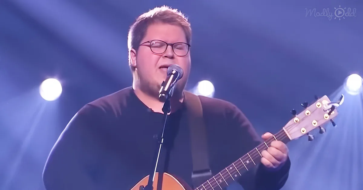 Man singing on The Voice