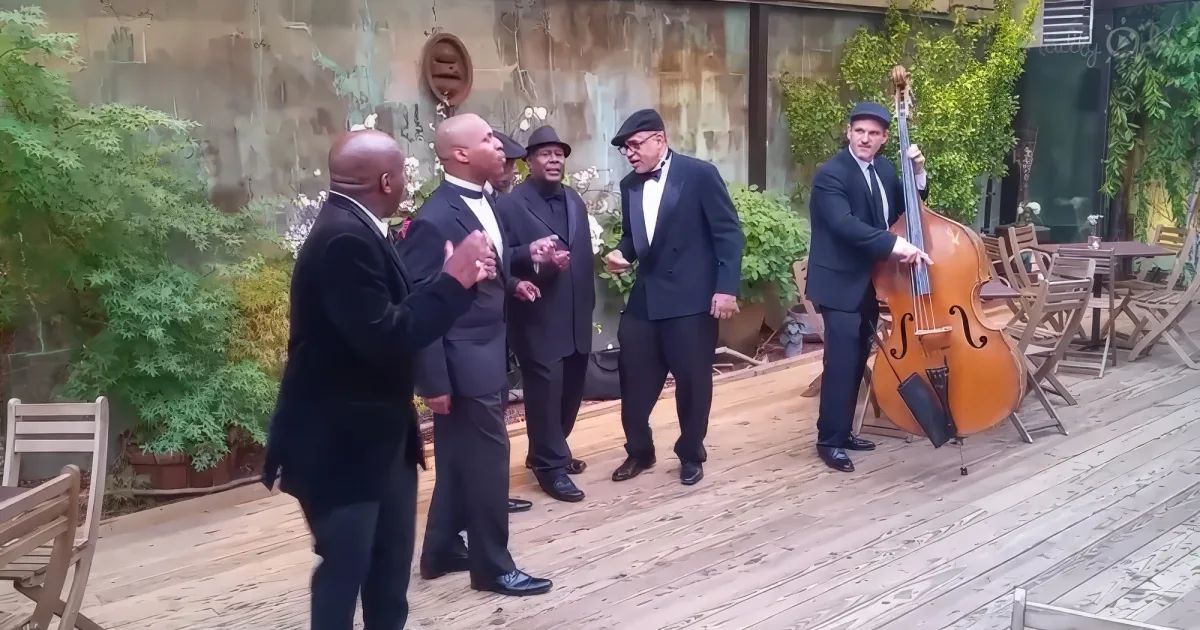Musical group singing "The Lion Sleeps Tonight'