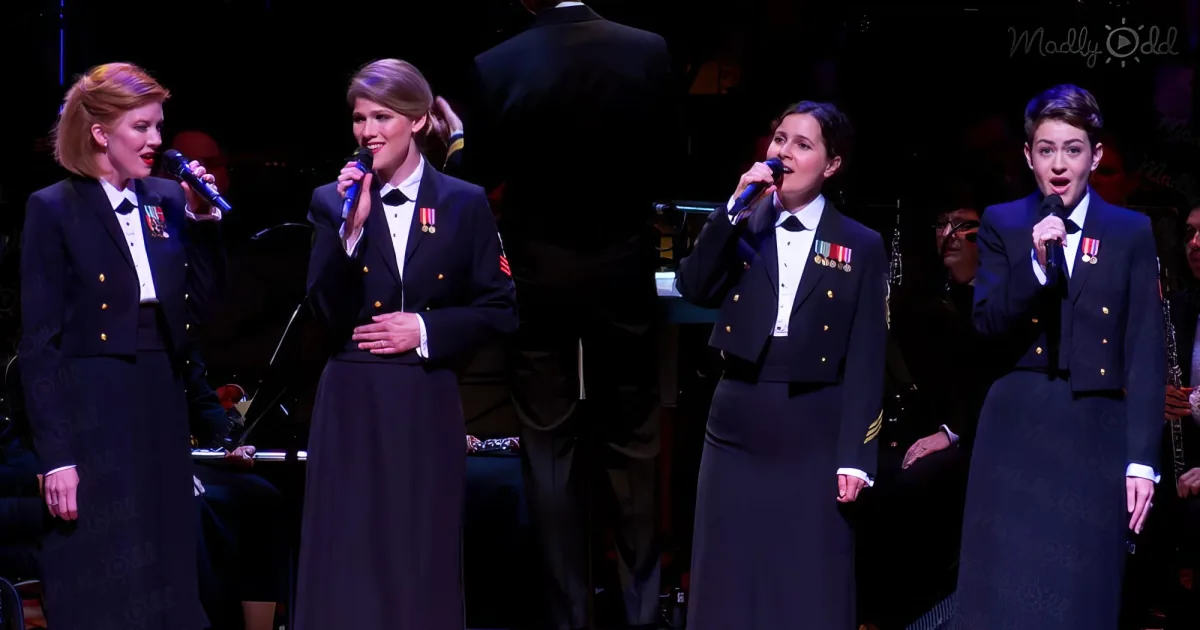 Four Navy women singing