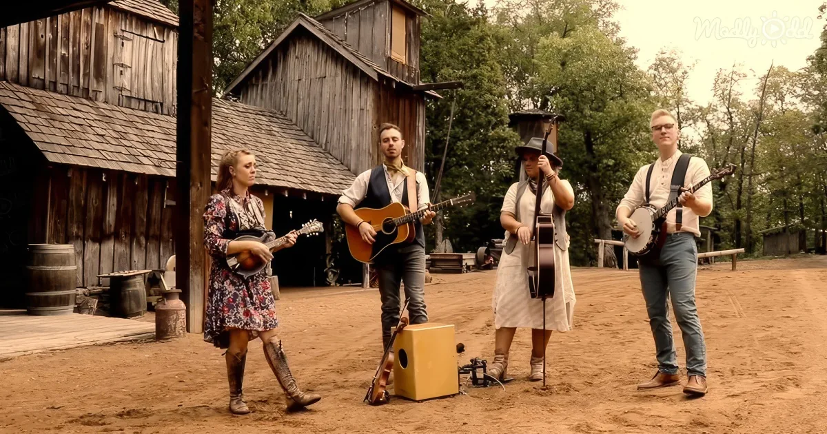 A group of musicians in a rustic setting plays traditional instruments.