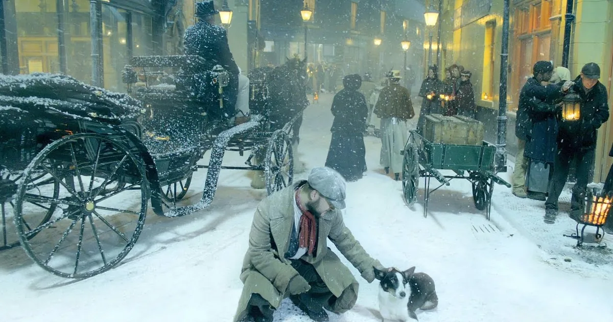 A man in a trench coat and hat stands in the snow with arms outstretched, surrounded by people and a horse-drawn carriage.