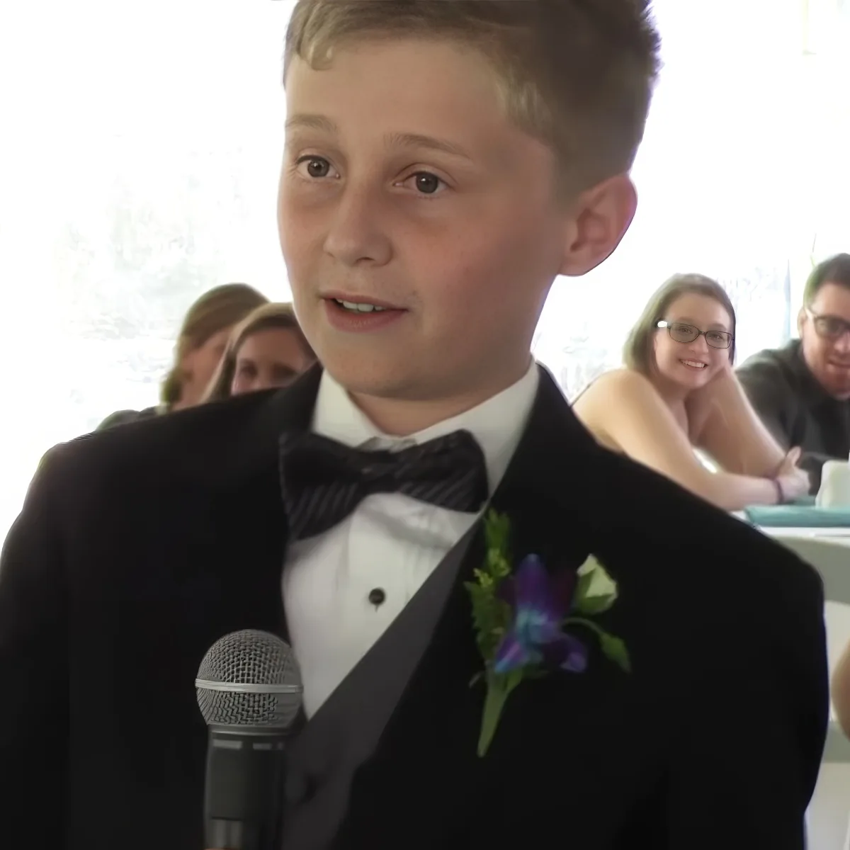 11-year-old boy giving best man speech