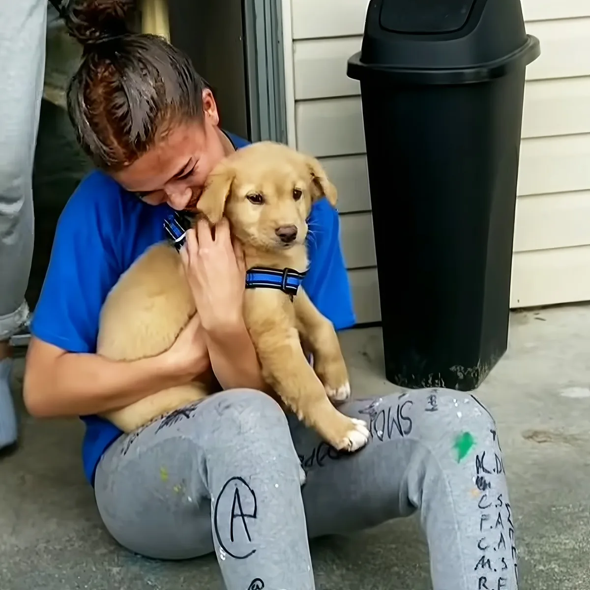 Teen girl with puppy