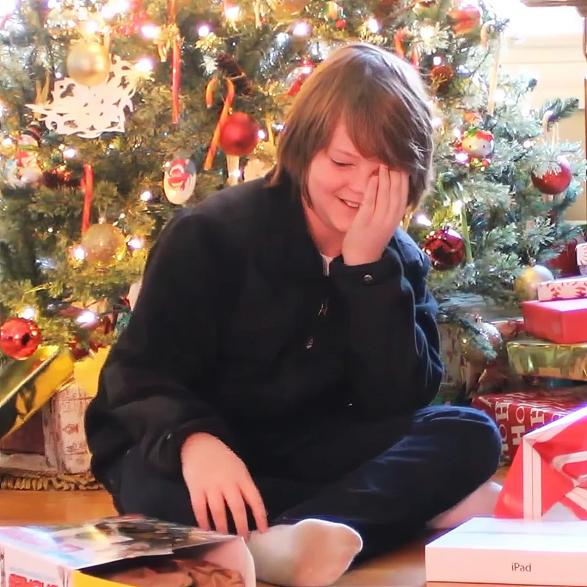 Kid opening "Extreme Chores" gift box