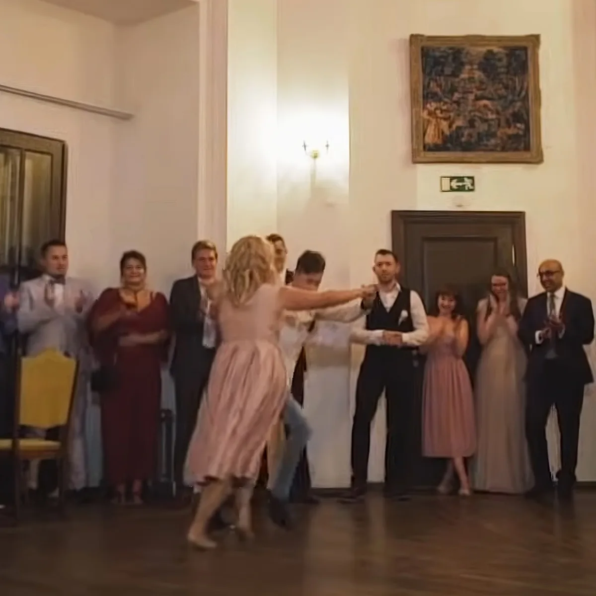 Bride and her brothers dancing