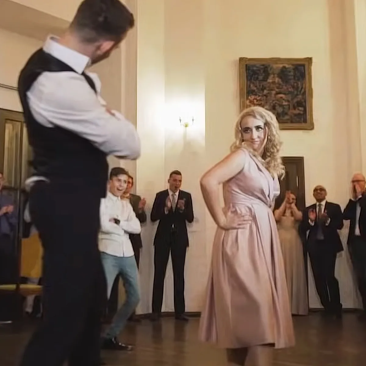 Bride and her brothers dancing