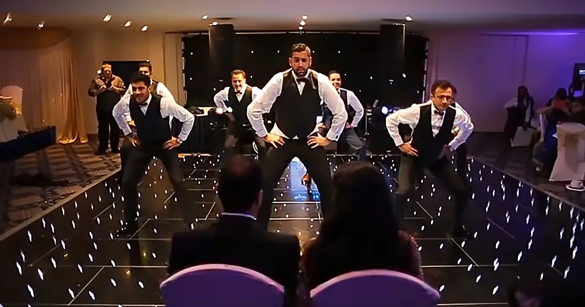7 brothers dancing at sister's wedding