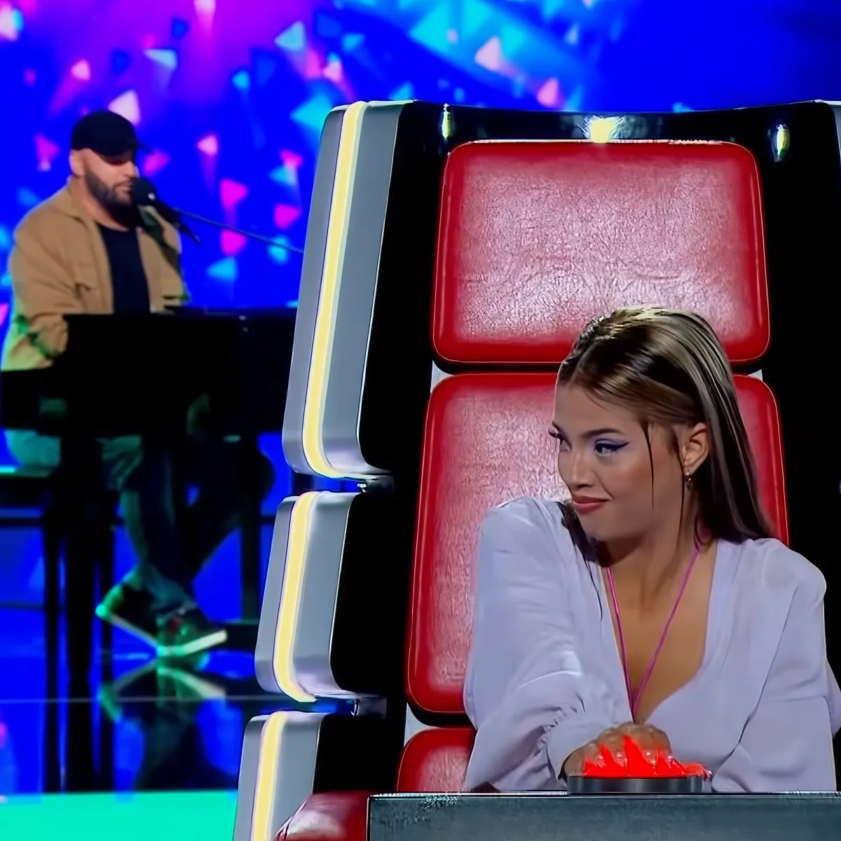 Singer performing in "The Voice"