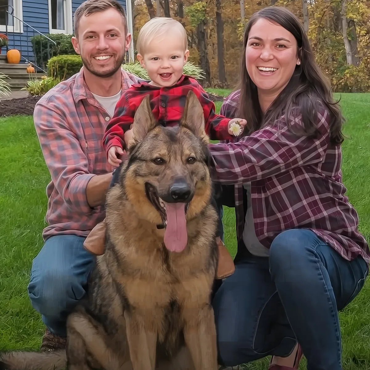Dog and baby with mom and dad