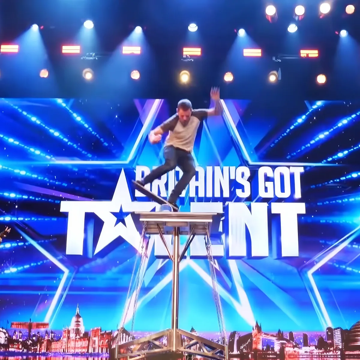 A performer balances on a narrow beam during a "Britain's Got Talent" audition.