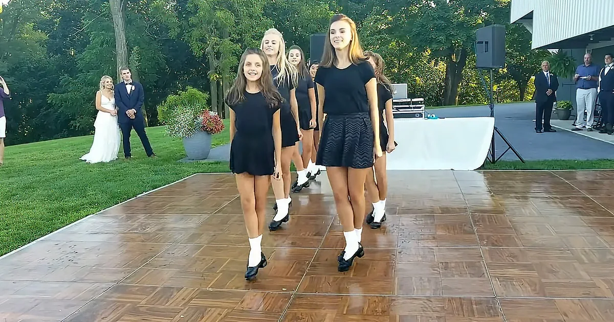 Students performing Irish stepdance at teacher’s wedding