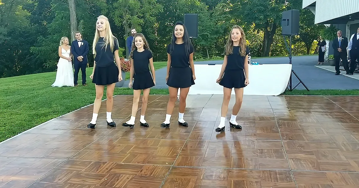 Students performing Irish stepdance at teacher’s wedding