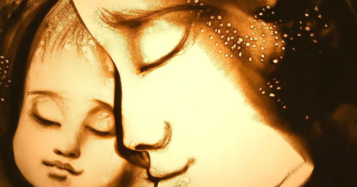 A close-up of a sand sculpture depicting a face with intricate details and warm lighting.