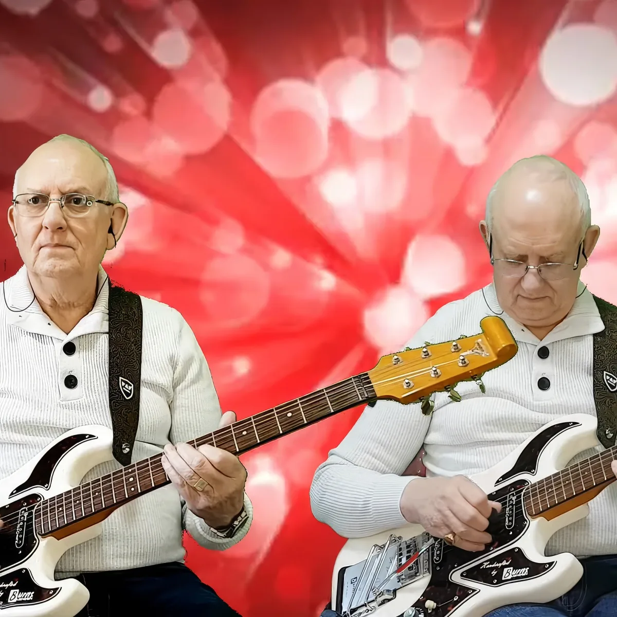 An elderly man plays a white electric guitar against a red bokeh background.