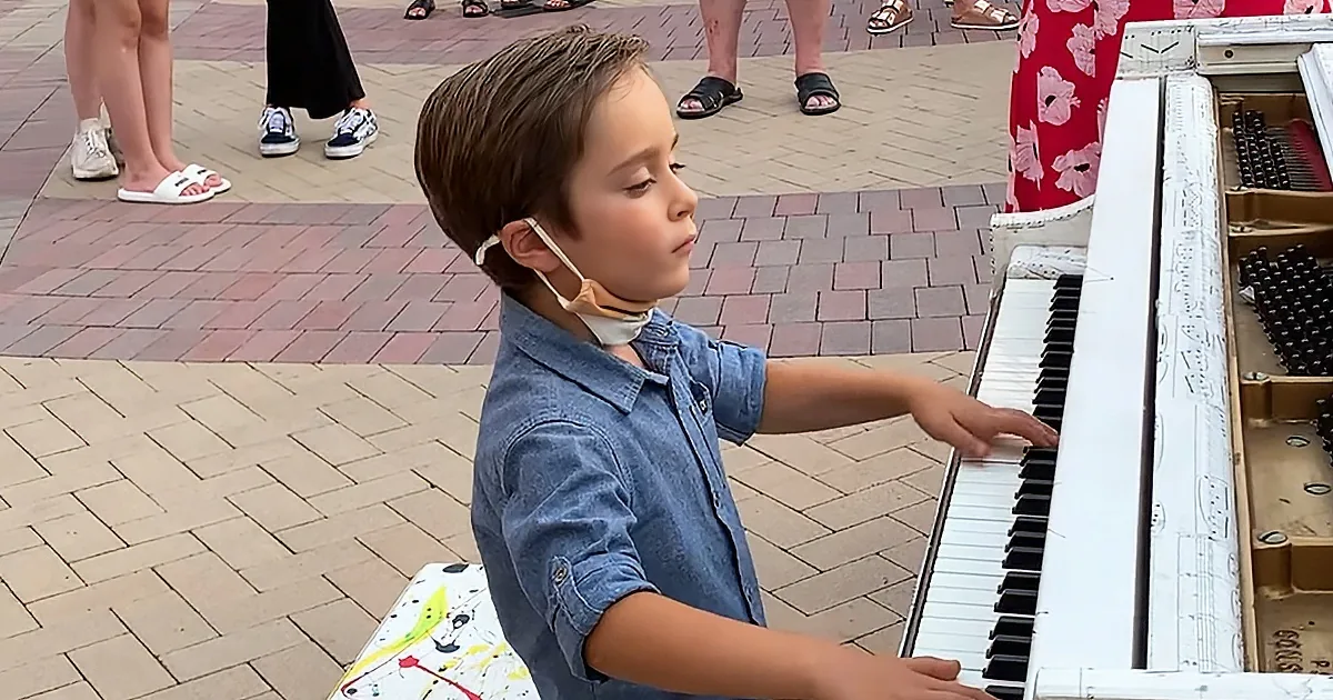 Kid playing piano