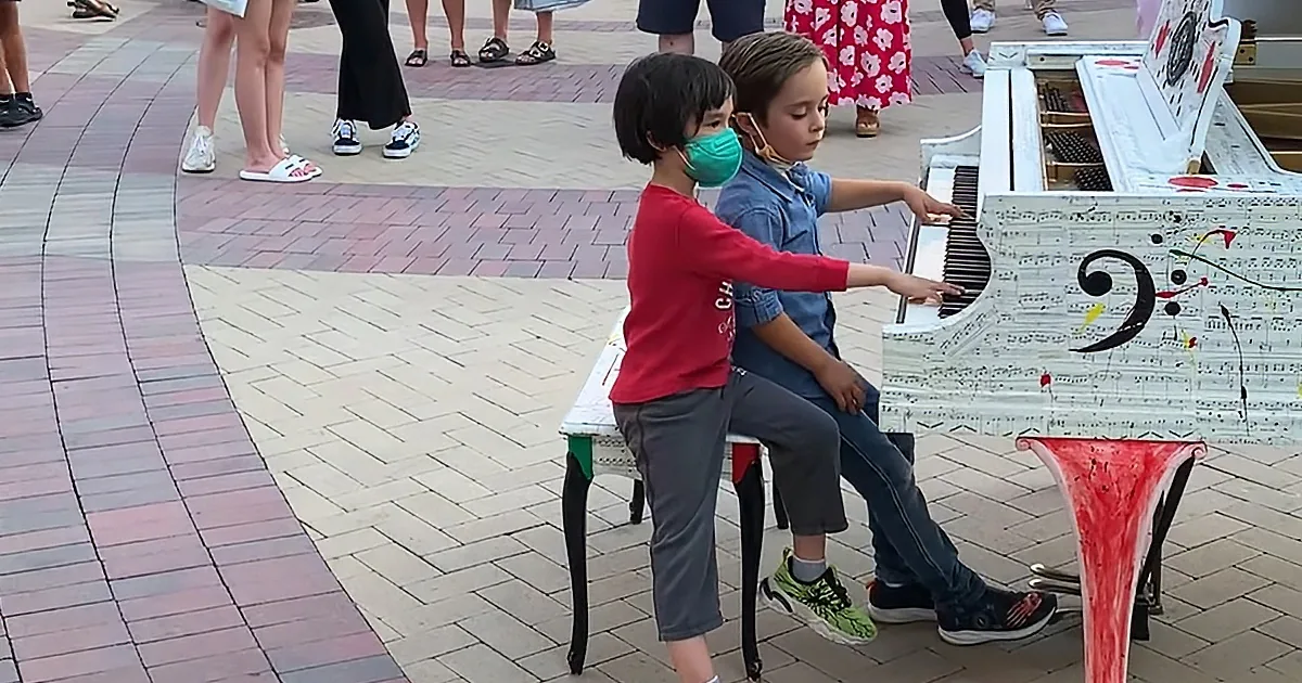 Kids playing piano