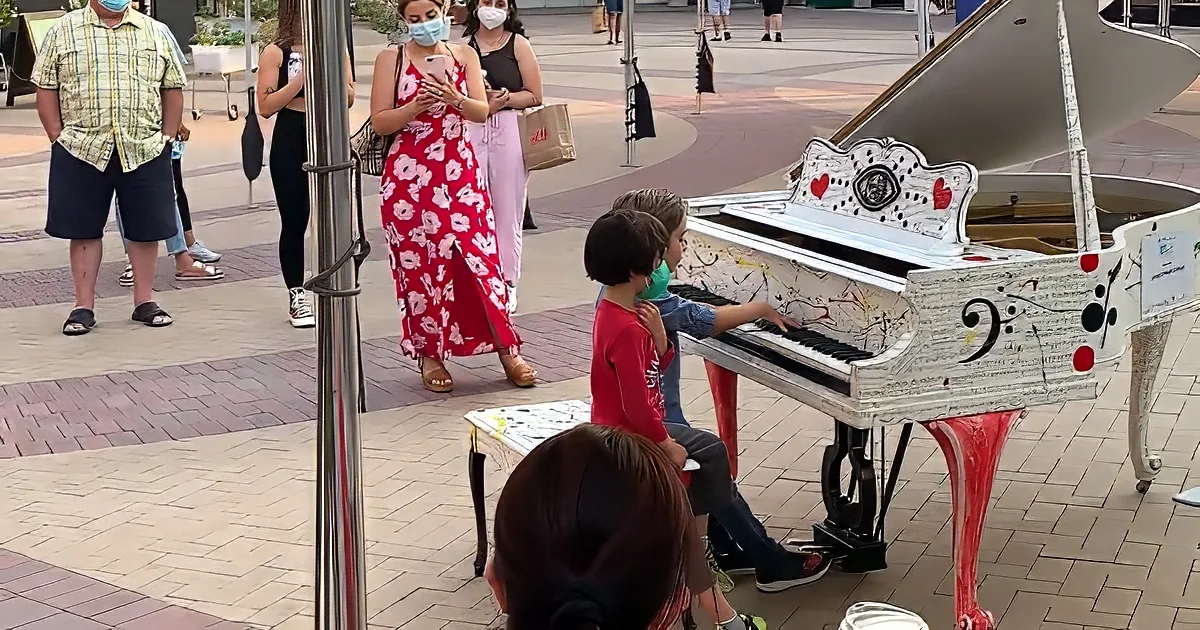 Kids playing piano