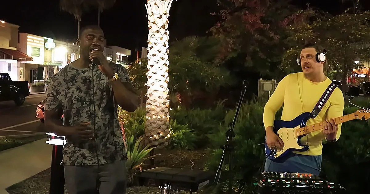 Busker and stranger singing