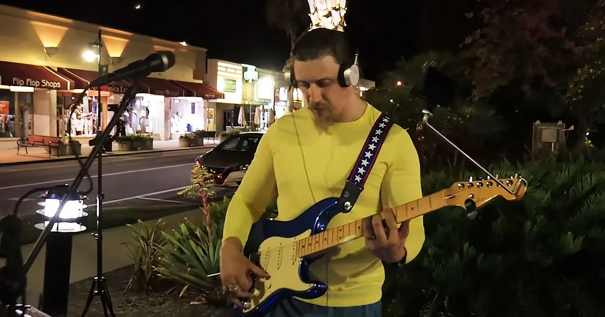 Busker and stranger singing
