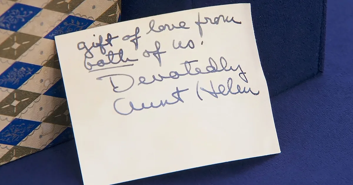 A handwritten note on a white card reads "Gift of love from Both of us, Devotedly Aunt Helen."