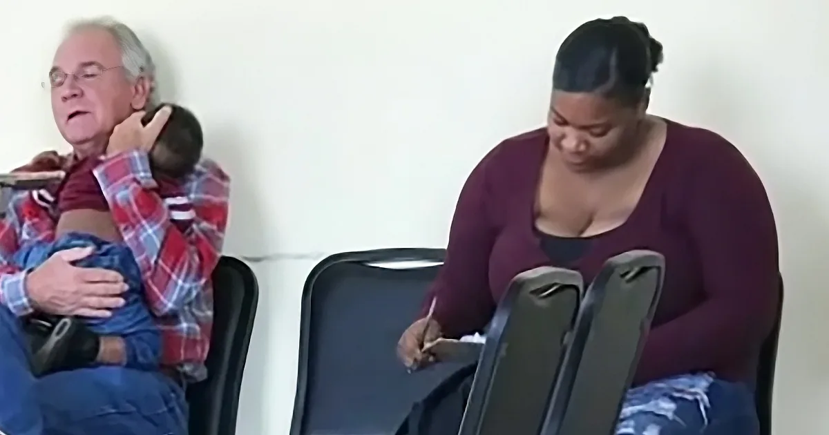 Grandpa Cradles Stranger's Baby in Waiting Room