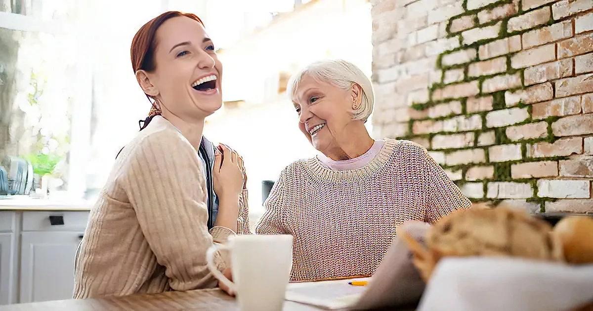 Mom and daughter laughing