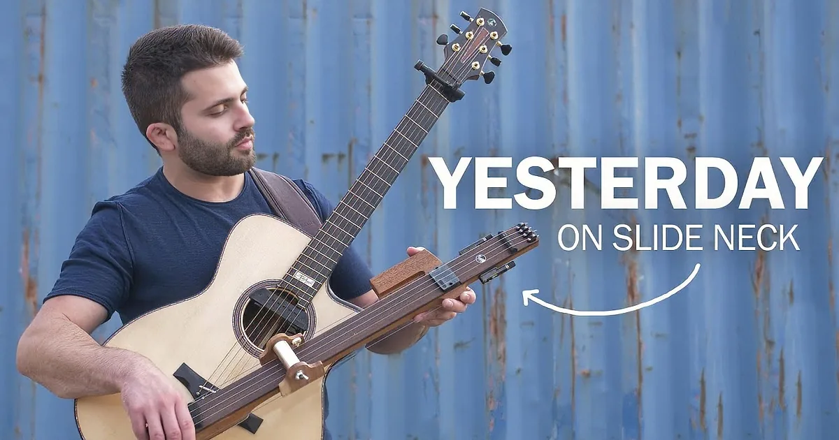 A man plays an acoustic guitar with a blue-toned background.