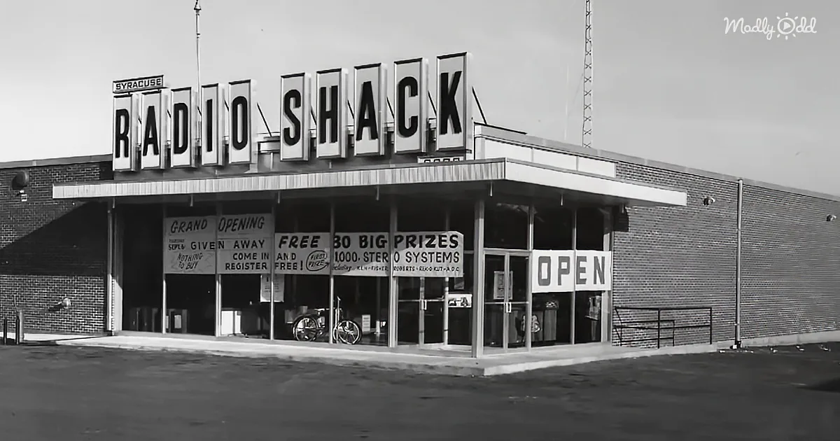 A Radio Shack store with a grand opening sign, prizes, and a bicycle inside.