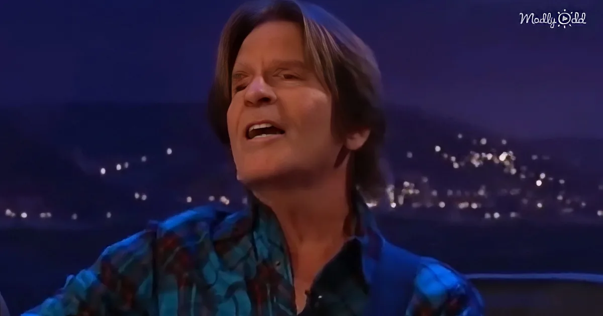 John Fogerty singing "Have You Ever Seen the Rain”